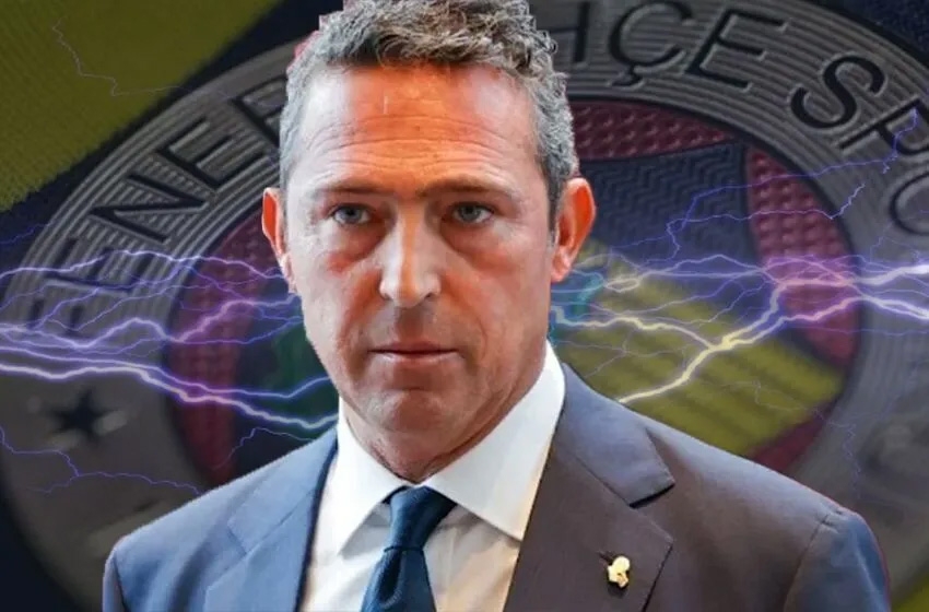 Ali Koç kılıcını biledi